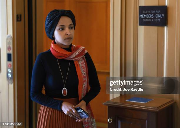 Rep. Ilhan Omar walks to the House chambers ahead of today's planned vote for Speaker of the House in the House of Representatives at the U.S....