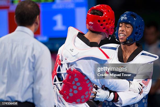 Olie Burton of USA competes with Jaouad Achab of Belgium during a men's -63 kg combat of WTF World Taekwondo Championships 2013 at the exhibitions...