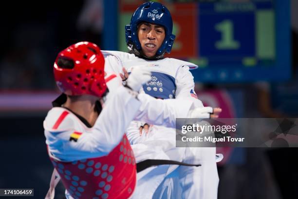 Olie Burton of USA competes with Jaouad Achab of Belgium during a men's -63 kg combat of WTF World Taekwondo Championships 2013 at the exhibitions...