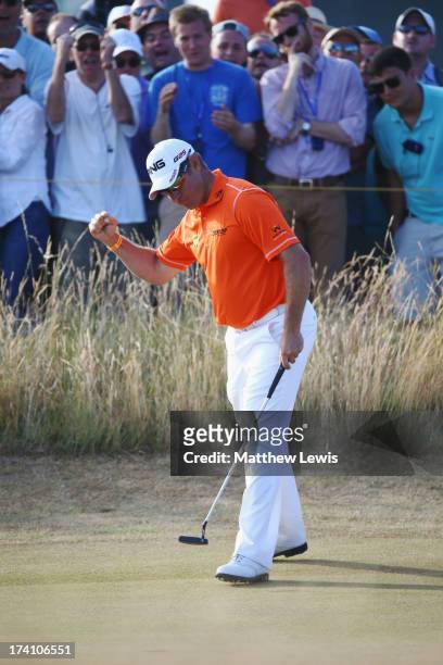 Lee Westwood of England celebrates a putt on the 17th during the third round of the 142nd Open Championship at Muirfield on July 20, 2013 in Gullane,...