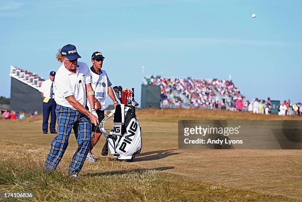 Miguel Angel Jimenez of Spain hits his third shot on the 14th during the third round of the 142nd Open Championship at Muirfield on July 20, 2013 in...
