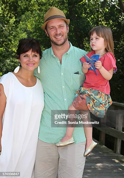 Tiffani Thiessen, husband Brady Smith and daughter Harper Smith attend The Children's Museum Of The East End 5th Annual Family Fair at Children's...