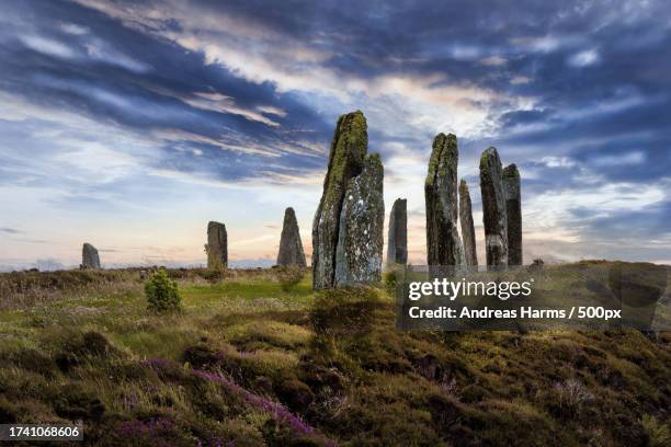 view of old ruins against cloudy sky - ancient world stock pictures, royalty-free photos & images