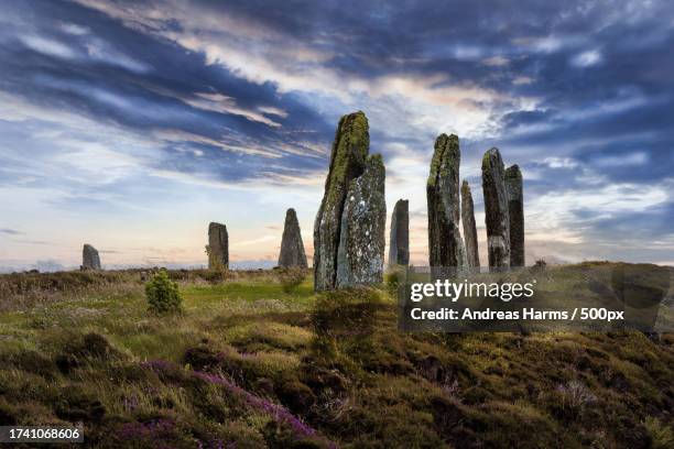 view of old ruins against cloudy sky - megalith stock pictures, royalty-free photos & images