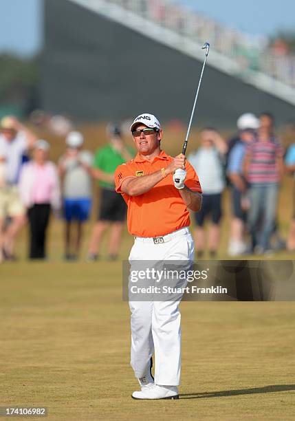 Lee Westwood of England hits an approach during the third round of the 142nd Open Championship at Muirfield on July 20, 2013 in Gullane, Scotland.