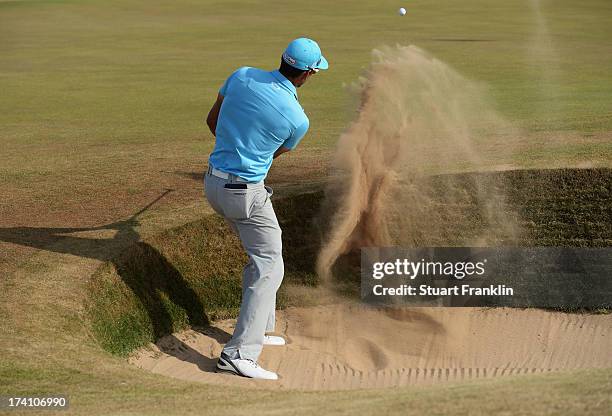 Rafael Cabrera-Bello of Spain hits out of the bunker during the third round of the 142nd Open Championship at Muirfield on July 20, 2013 in Gullane,...