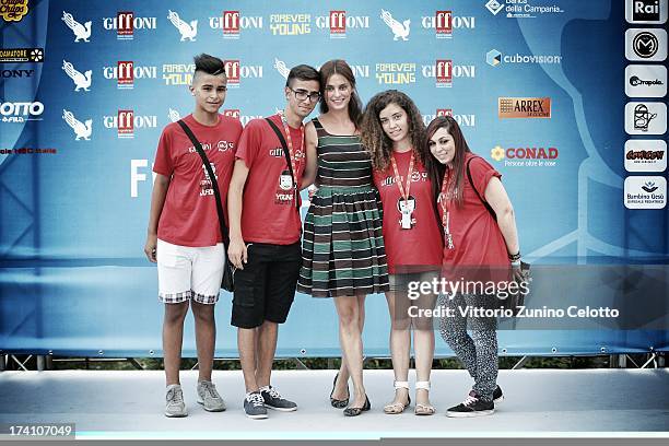 Catrinel Marlon attends 2013 Giffoni Film Festival photocall on July 20, 2013 in Giffoni Valle Piana, Italy.