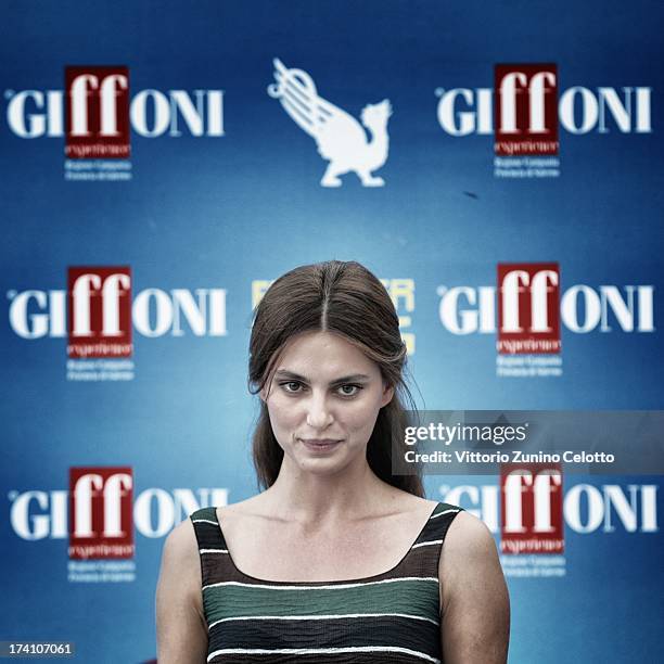 Catrinel Marlon attends 2013 Giffoni Film Festival photocall on July 20, 2013 in Giffoni Valle Piana, Italy.