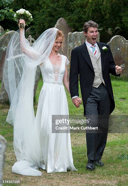 Alicia Fox-Pitt and Sebastian Stoddart after getting married at the Holy Cross church in Goodnestone on July 20, 2013 in Dover, England.