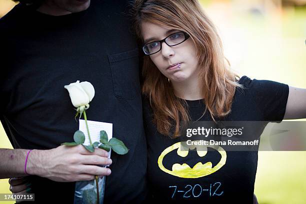 Stephanie Wacker attends a remembrance ceremony July 20, 2013 in Aurora, Colorado. The ceremony marks the one one-year anniversary of the Aurora...