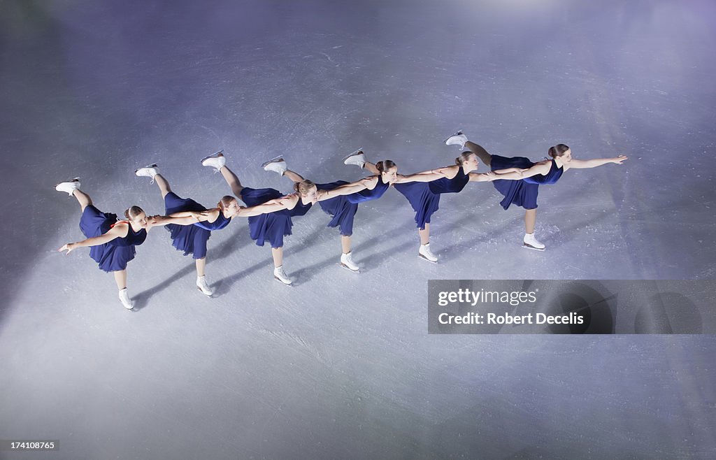 Synchro team performing in a line.