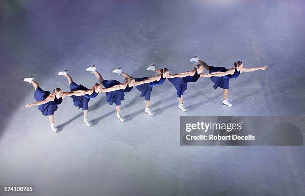 synchro team performing in a line. - team performance stock pictures, royalty-free photos & images