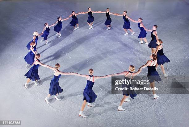 synchro skating team perfoming routine. - dance routine stock pictures, royalty-free photos & images