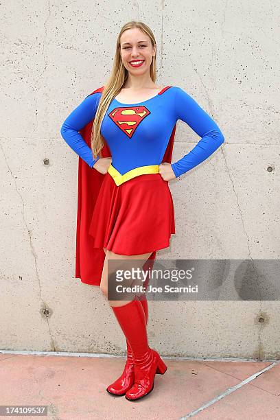 Guest in a Superwoman costume attends Comic-Con International 2013 - Day 3 on July 20, 2013 in San Diego, California.