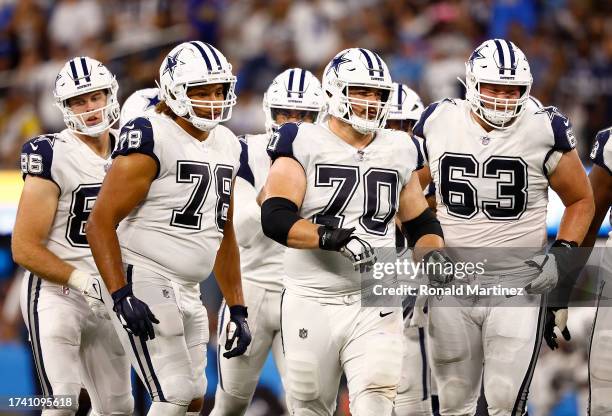 Terence Steele, Zack Martin and Tyler Biadasz of the Dallas Cowboys at SoFi Stadium on October 16, 2023 in Inglewood, California.