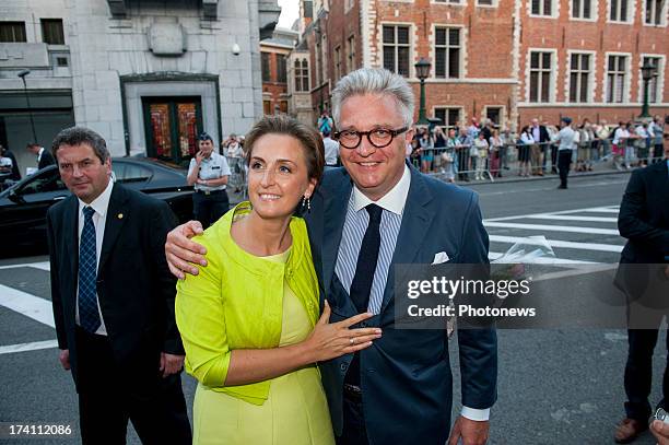 Prince Laurent of Belgium and Princess Claire of Belgium depart a concert held ahead of Belgium abdication & coronation at the Bozar on July 20, 2013...