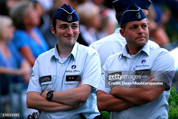 Two policemen look on during the 'Bal National' Held Ahead Of Belgium Abdication & Coronation on July 20, 2013 in Brussels, Belgium.
