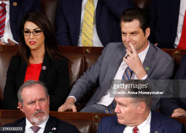 Rep. Lauren Boebert and Rep. Matt Gaetz sit together as the House of Representatives elects a new Speaker of the House at the U.S. Capitol Building...