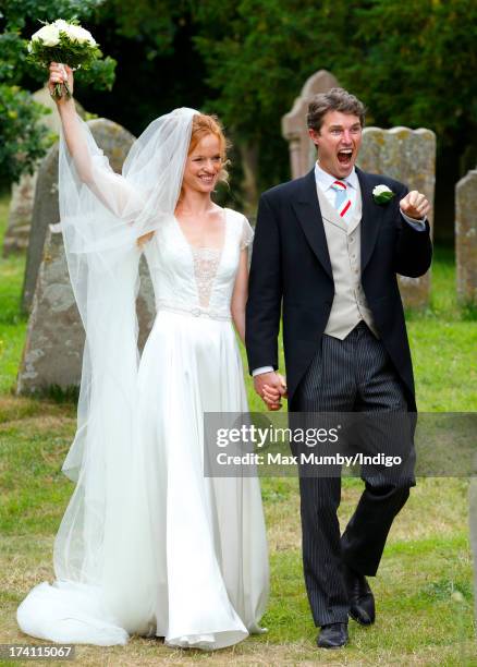 Alicia Fox-Pitt and Sebastian Stoddart leave The Church of the Holy Cross after their wedding in Goodnestone on July 20, 2013 near Dover, England.