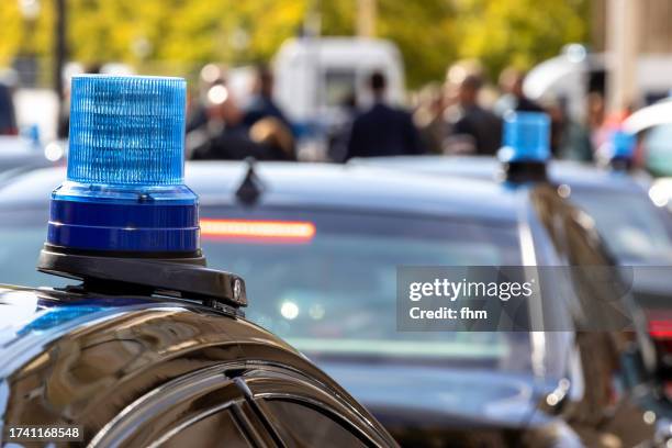 police lights on many unmarked civil cars of the german police - germany police stock pictures, royalty-free photos & images