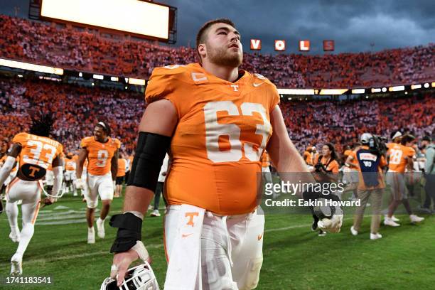 Cooper Mays of the Tennessee Volunteers walks off the field following their win over the Texas A&M Aggies at Neyland Stadium on October 14, 2023 in...