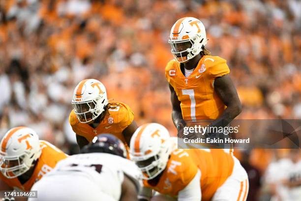 Joe Milton III of the Tennessee Volunteers waits for the snap against the Texas A&M Aggies in the fourth quarter at Neyland Stadium on October 14,...