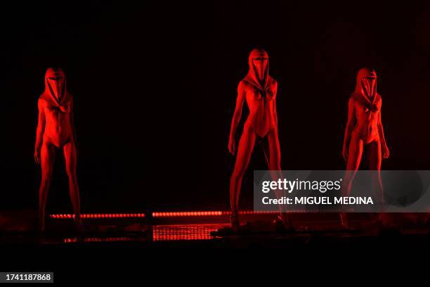 Dancers perform in "The Empire Strips Back", a burlesque parody of Star Wars at the Marie-Bell gymnasium theater in central Paris on October 22,...