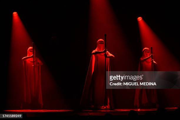 Dancers perform in "The Empire Strips Back", a burlesque parody of Star Wars at the Marie-Bell gymnasium theater in central Paris on October 22,...