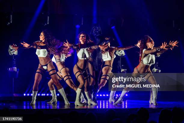 Dancers perform in "The Empire Strips Back", a burlesque parody of Star Wars at the Marie-Bell gymnasium theater in central Paris on October 22,...