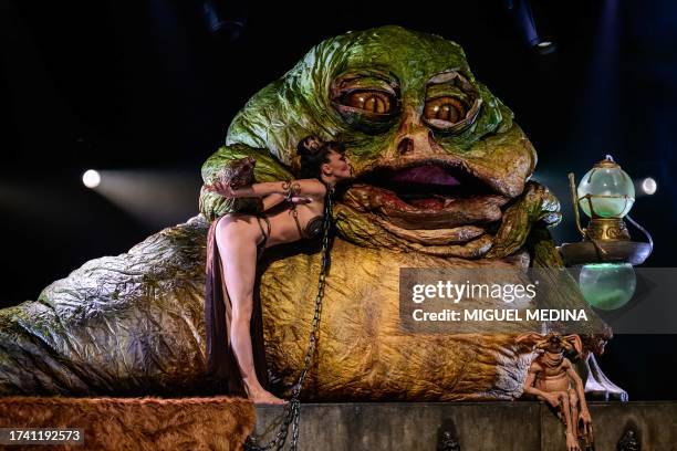 Dancer performs in "The Empire Strips Back", a burlesque parody of Star Wars at the Marie-Bell gymnasium theater in central Paris on October 22,...