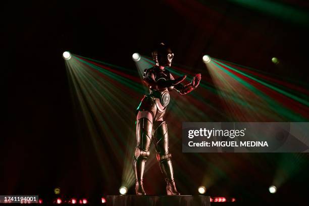 Dancer performs in "The Empire Strips Back", a burlesque parody of Star Wars at the Marie-Bell gymnasium theater in central Paris on October 22,...