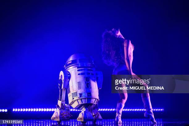 Dancer performs in "The Empire Strips Back", a burlesque parody of Star Wars at the Marie-Bell gymnasium theater in central Paris on October 22,...