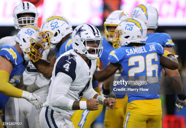 Dak Prescott of the Dallas Cowboys reacts after he is sacked during a 20-17 win over the Los Angeles Chargers at SoFi Stadium on October 16, 2023 in...
