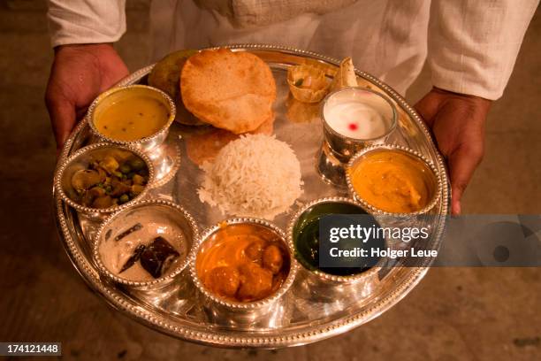 thali dinner at amrit rao peshwa palace - benares restaurant stock pictures, royalty-free photos & images