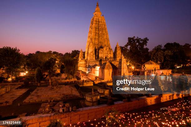 mahabodhi temple at dusk - bihar stock pictures, royalty-free photos & images