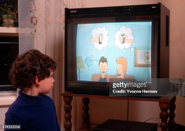 Child is photographed watching a controversial 'Beavis and Butt-head' fire episode on television October 4, 1993 in New York City.