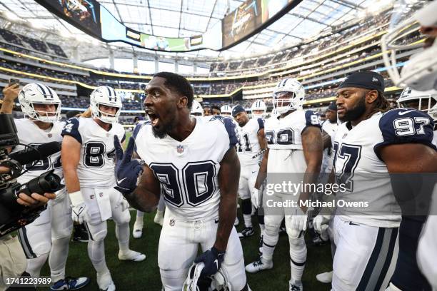 DeMarcus Lawrence of the Dallas Cowboys reacts as he leads a huddle during an NFL football game between the Los Angeles Chargers and the Dallas...