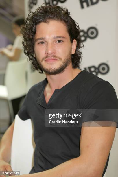 In this handout photo provided by WBTV - Fan-favorite Kit Harington at the Game Of Thrones signing in the Warner Bros. Booth at the San Diego...