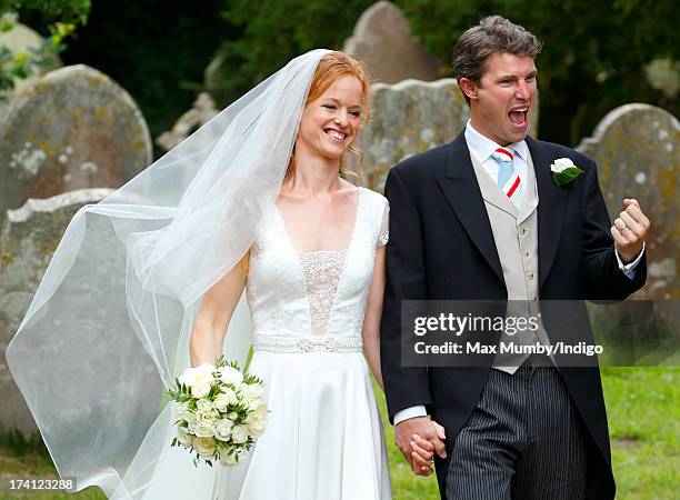 Alicia Fox-Pitt and Sebastian Stoddart leave The Church of the Holy Cross after their wedding in Goodnestone on July 20, 2013 near Dover, England.