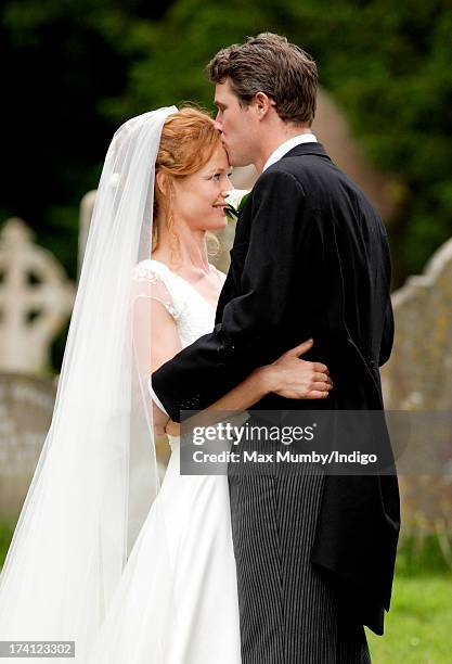 Alicia Fox-Pitt and Sebastian Stoddart leave The Church of the Holy Cross after their wedding in Goodnestone on July 20, 2013 near Dover, England.