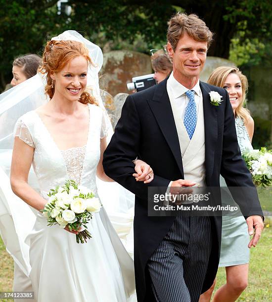 William Fox-Pitt escorts his sister Alicia Fox-Pitt to The Church of the Holy Cross for her wedding to Sebastian Stoddart in Goodnestone on July 20,...