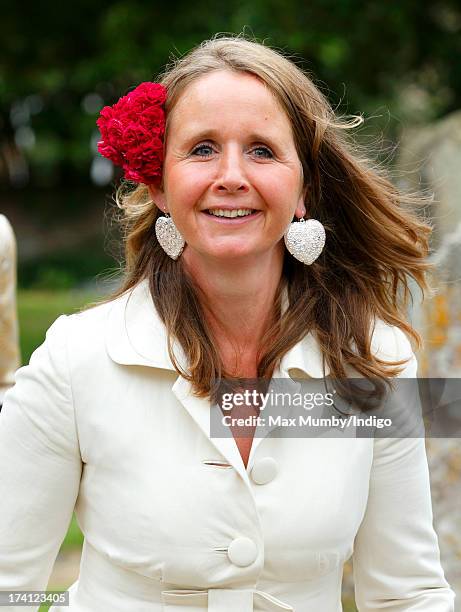 Alice Plunkett attends the wedding of Alicia Fox-Pitt and Sebastian Stoddart at The Church of the Holy Cross in Goodnestone on July 20, 2013 near...