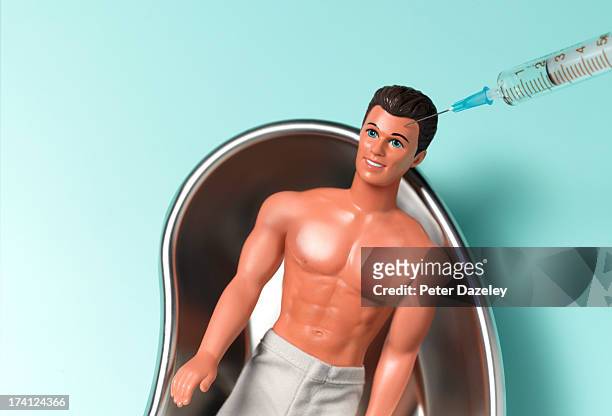 man's botox injection - doll stock pictures, royalty-free photos & images