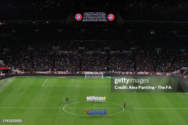 Players, match officials and fans observe a minute's silence in memory of two Swedish supporters, victims of yesterday’s terrorist attack in Brussels...