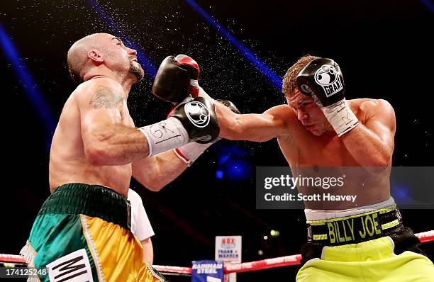 Billy Joe Saunders connects with Gary O'Sullivan during their WBO International Middleweight Championship bout at Wembley Arena on July 20, 2013 in...