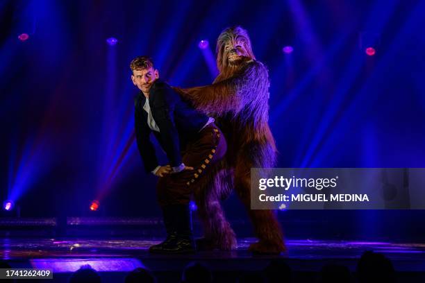 Dancers perform, one as Chewbacca, in "The Empire Strips Back", a burlesque parody of Star Wars at the Marie-Bell gymnasium theatre in central Paris...