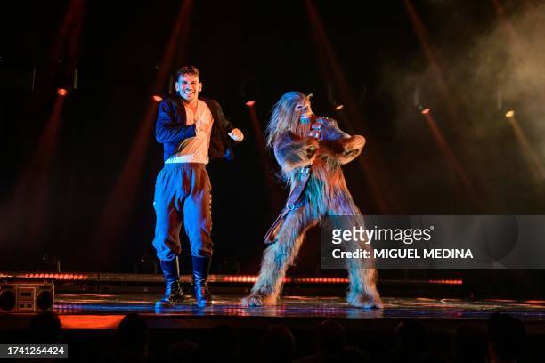 Dancers perform, one as Chewbacca, in "The Empire Strips Back", a burlesque parody of Star Wars at the Marie-Bell gymnasium theatre in central Paris...