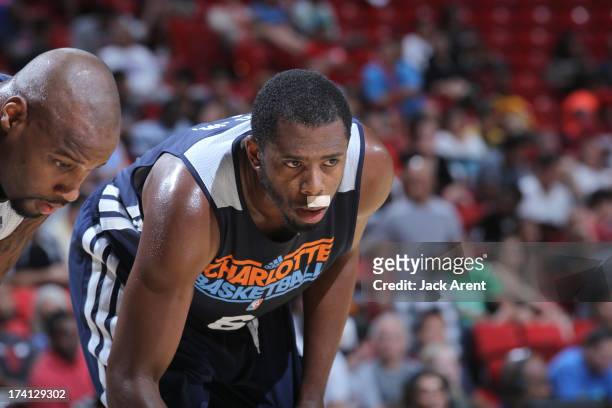 Patrick Ewing Jr. #6 of the Charlotte Bobcats is back on court after a nose injury during NBA Summer League game between the D League Select and the...