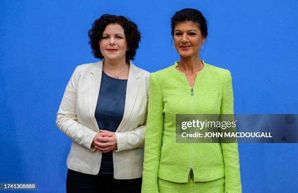 Sahra Wagenknecht , politician of Germany's left-wing Die Linke party, and Die Linke party parliamentary group co-leader Amira Mohamed Ali pose...