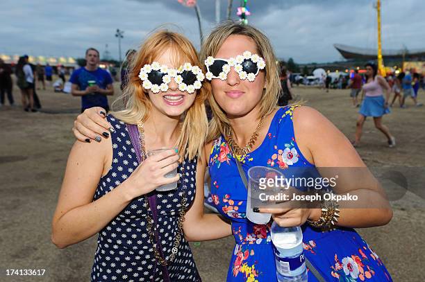 Festival-goers pose at Electric Daisy Carnival: London 2013 at Queen Elizabeth Olympic Park on Juy 20, 2013 in London and England. Performs...